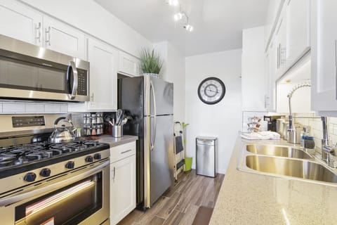 Stylish and functional, this modern kitchen boasts appliances.