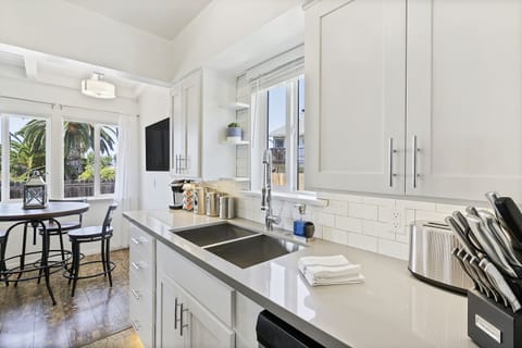 A double sinks in this stylish kitchen are perfect for efficient cooking.