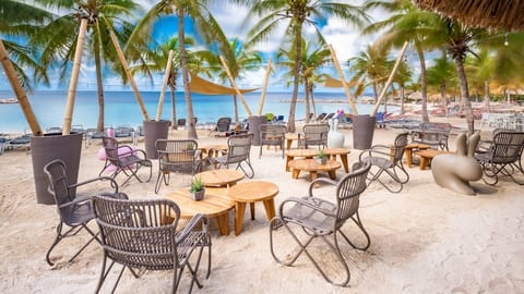 On the beach, sun loungers, beach umbrellas, beach towels