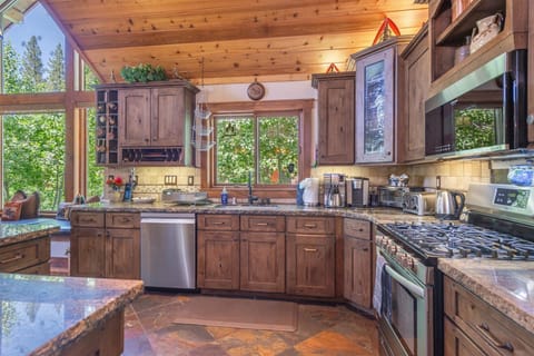 Chefs kitchen with all new appliances in 2025 dishwasher, oven and refrigerator