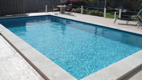 Outdoor pool, a lap pool, sun loungers