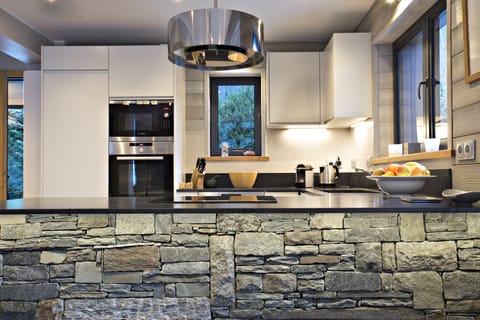 Granite breakfast bar reclaimed from original house before renovation