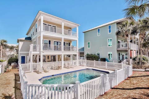 A heated pool, sun loungers