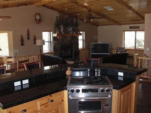 Living room and dining area from kitchen view -large dining table to the left