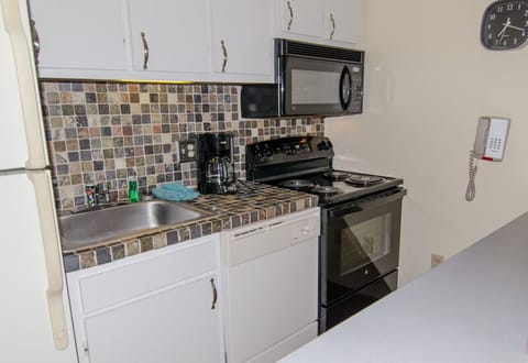Remodeled kitchen is fully-equipped with pots, pans & utensils.