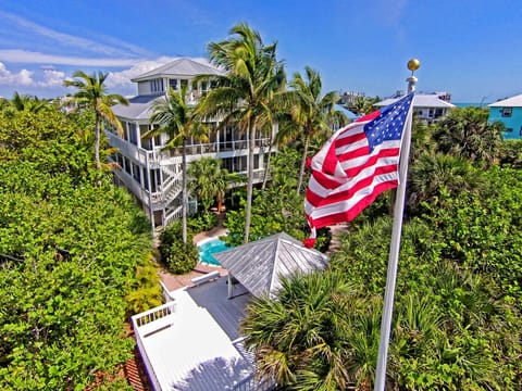 aerial view of house from beach side showing heated pool gazebo private walkway