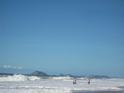 On the beach, sun loungers, beach towels