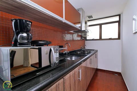 Fridge, microwave, coffee/tea maker, toaster