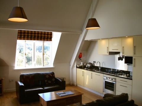 The kitchen is fully equipped including dishwasher and washing machine/dryer