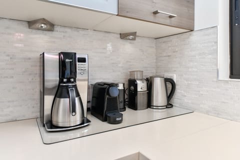 Nespresso, drip coffee, kettle, grinder, milk frother. Coffee, tea, sugar supply