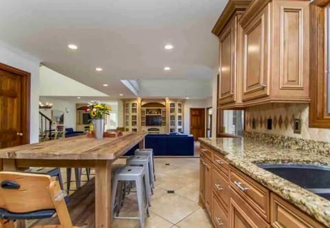 [Kitchen] The Kitchen is Fully Stocked and Ready for you to Create the Family Meal of your Dreams. Including Stainless Steel Appliances, a Large Refrigerator, a Drip Coffee Maker and so Much More.