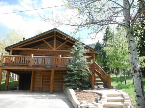 Situated on 4 acres of aspens and mature pines.