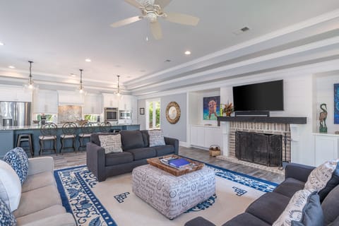 Beautifully decorated open concept family room.