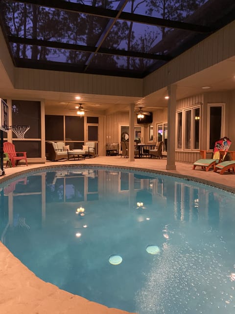 1 Bald Eagle W., screened pool area, including dining table and casual seating