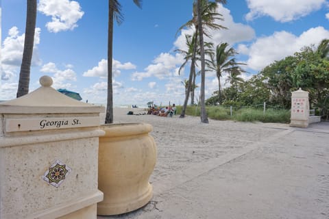 On the beach, sun loungers, beach towels