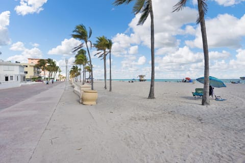 On the beach, sun loungers, beach towels