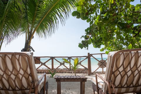 On the beach, sun loungers, beach towels