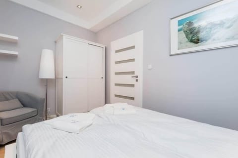 Comfortable double bed in the bedroom. 