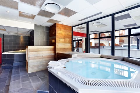 Soak sore muscles in the shared indoor hot tub.