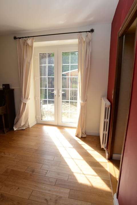 a view out to the patio from the salon