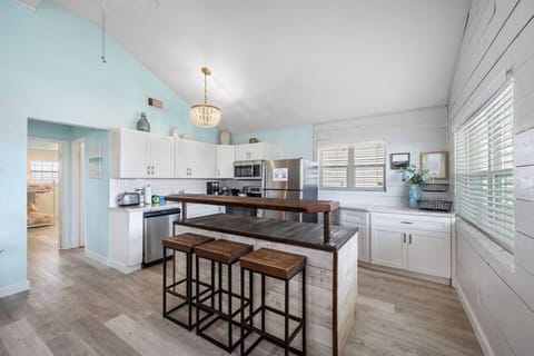 Create, innovate, and indulge in our chic and well-appointed kitchen