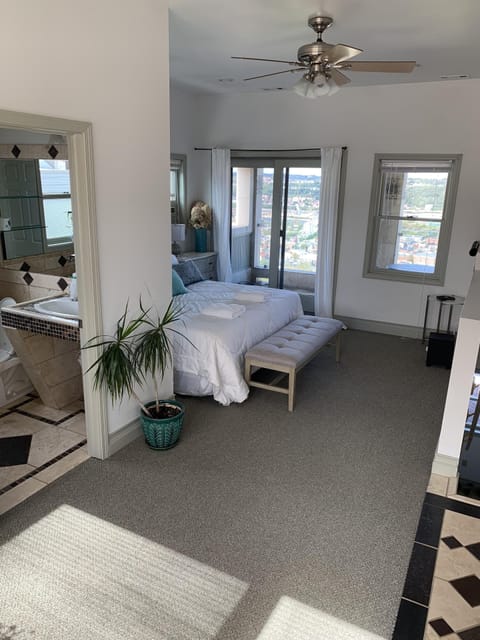 Master suite with private full bath and balcony overlooking Southside and city!