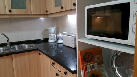 Fridge, microwave, dishwasher, coffee/tea maker