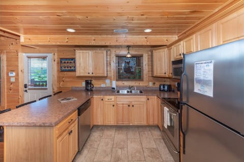 The kitchen is stocked with essentials to cook family meals, as well as a standard 12 cup coffee maker & Keurig!