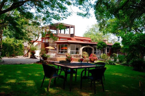 Enjoy breakfast under a canopy of trees