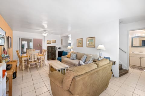 The living room and dining area have an open layout that fits your whole group