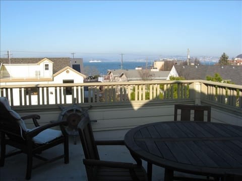 Rooftop deck view of the Sound and ferries.  Alki beach 1/2 block away.