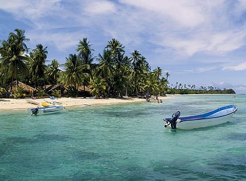 On the beach, sun loungers, beach towels