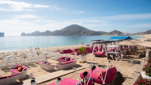 On the beach, sun loungers, beach towels