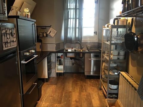 Microwave, dishwasher, coffee/tea maker, cookware/dishes/utensils