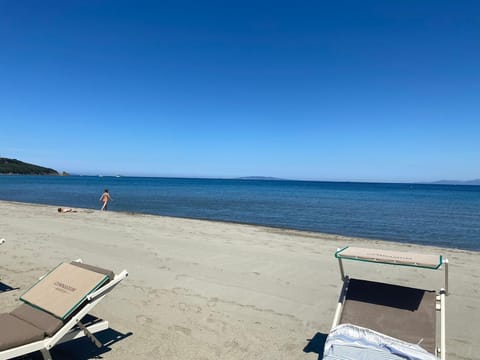 Beach nearby, sun loungers