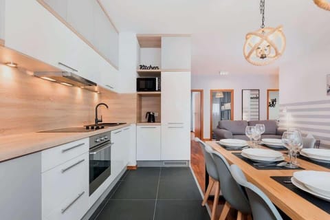 The kitchenette creates the perfect space for cooking home-cooked meals.