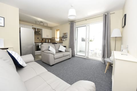 The living area leads to the south facing balcony.