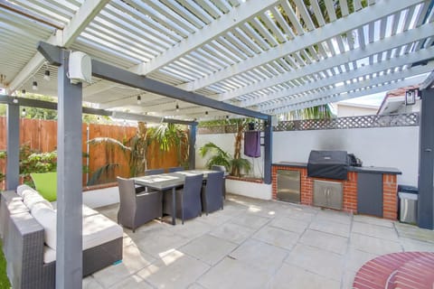 Dine outside while enjoying a game on TV and grill (DCS grill) our favorite meal