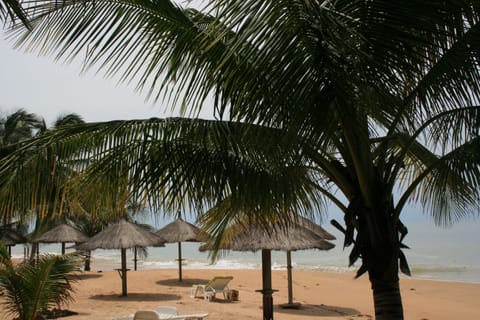 On the beach, sun loungers, beach towels