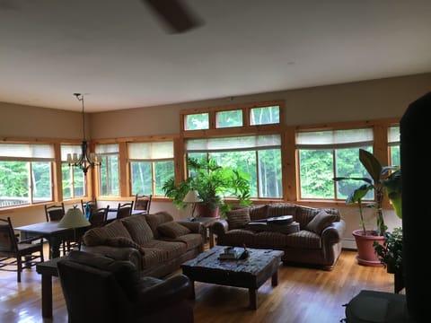 Upstairs Living Room. Panoramic views of the private woods
