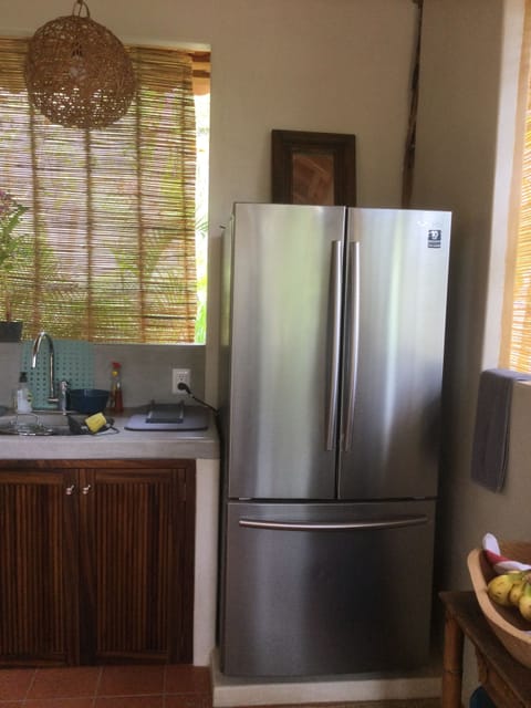 Fridge, stovetop, coffee/tea maker, electric kettle