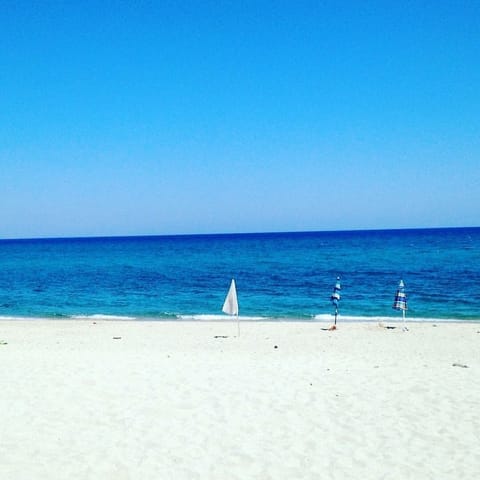 On the beach, sun loungers