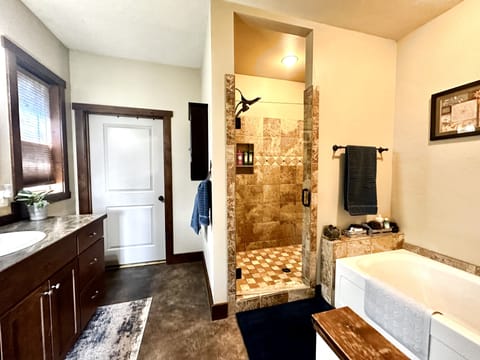 Combined shower/tub, hair dryer, towels, soap