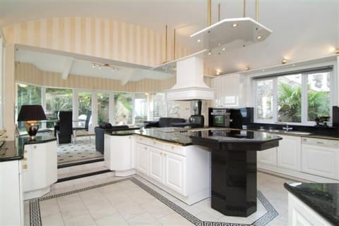 Large kitchen with dinette and sitting area.