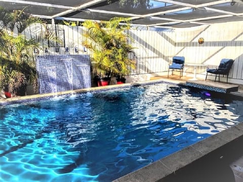 Pool w/waterfall and salt water filter system, which eliminates harch chlorines.