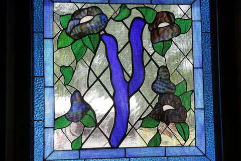 Stained glass window in stairway