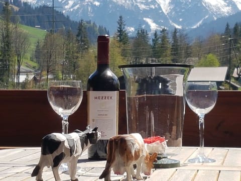 Mountain, Table, Tableware, Drinkware, Stemware, Furniture, Bottle, Wine Glass, Barware