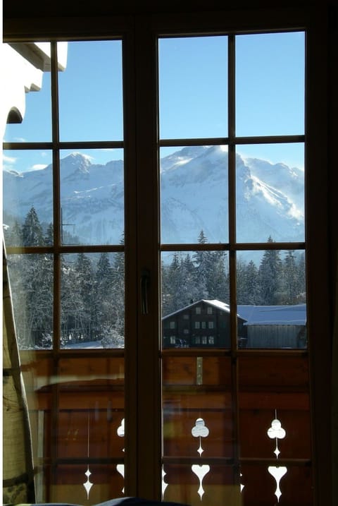 Sky, Cloud, Window, Building, Shade, Mountain, Tints And Shades, Glass, Wood