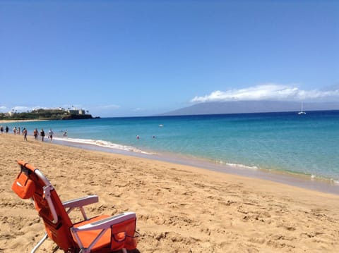 On the beach, sun loungers, beach towels