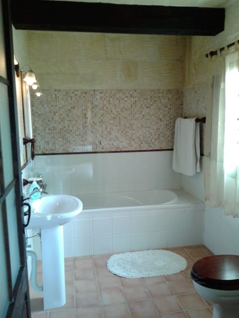 Combined shower/tub, hair dryer, towels, soap